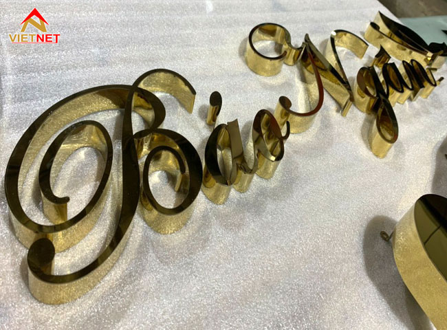 logo-chu-inox-vang-guong-bao-ngan