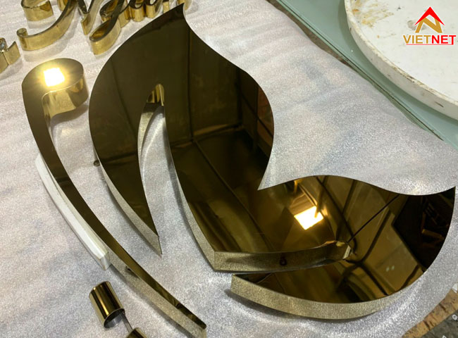 logo-chu-inox-vang-guong-bao-ngan