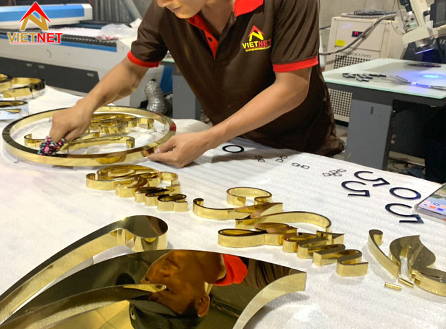 logo-chu-inox-vang-guong-bao-ngan